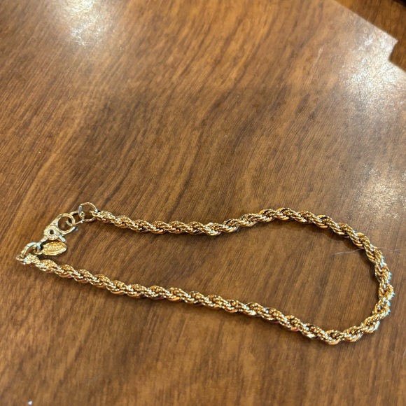 Monet braided twisted gold toned chain bracelet. Very dainty looking. - Picture 2 of 3